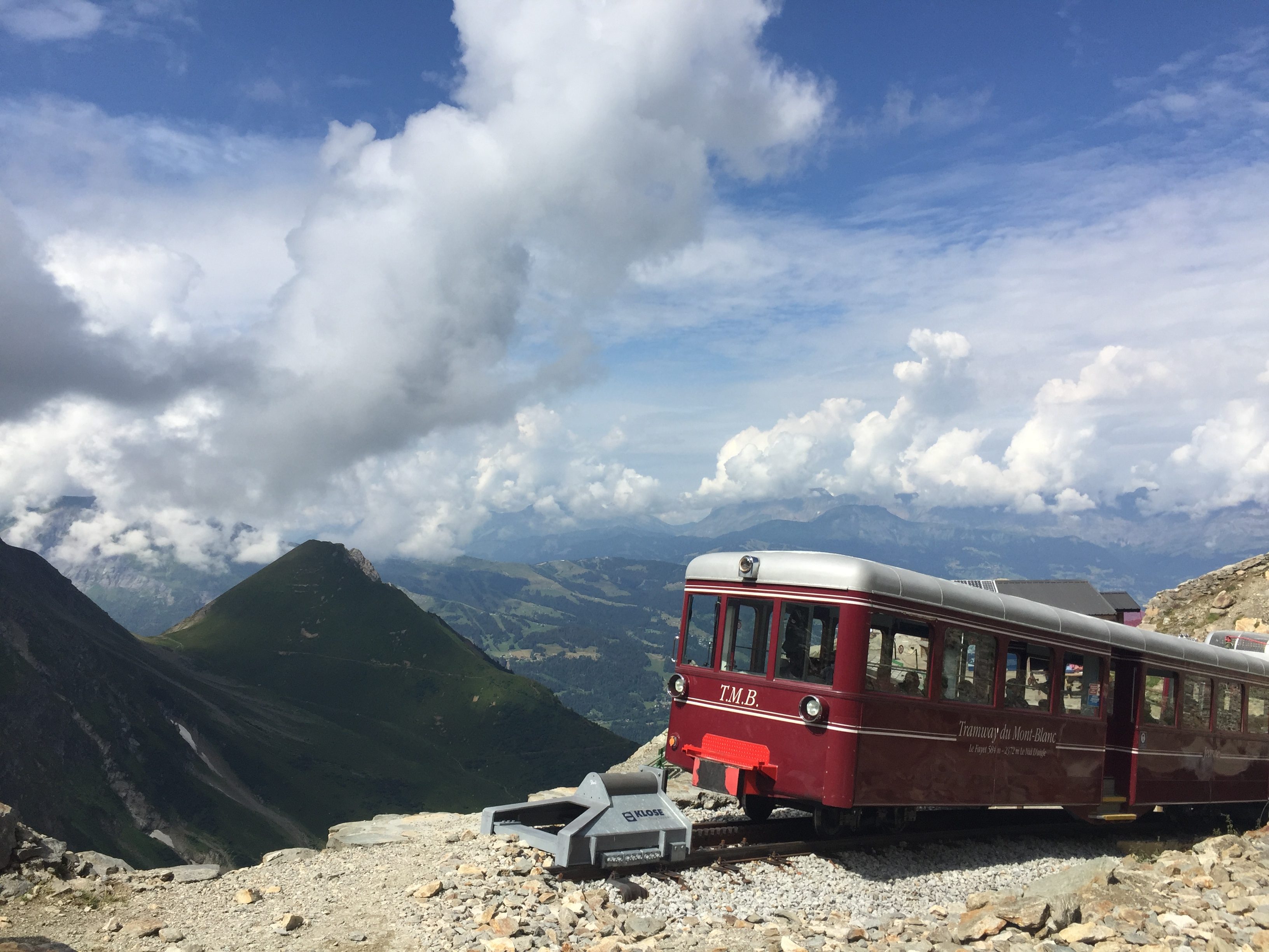 Train running along a mountain valley, an image of the time taken by transitions